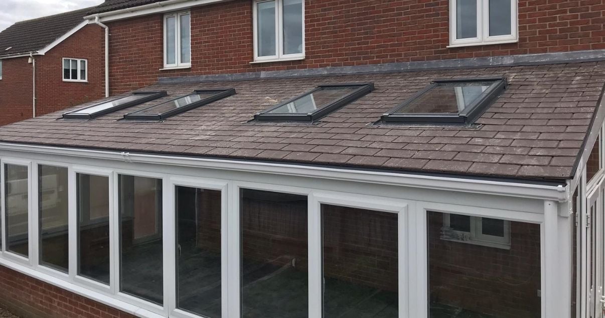 Solid conservatory Guardian roof with velux skylines that provide a brighter interior